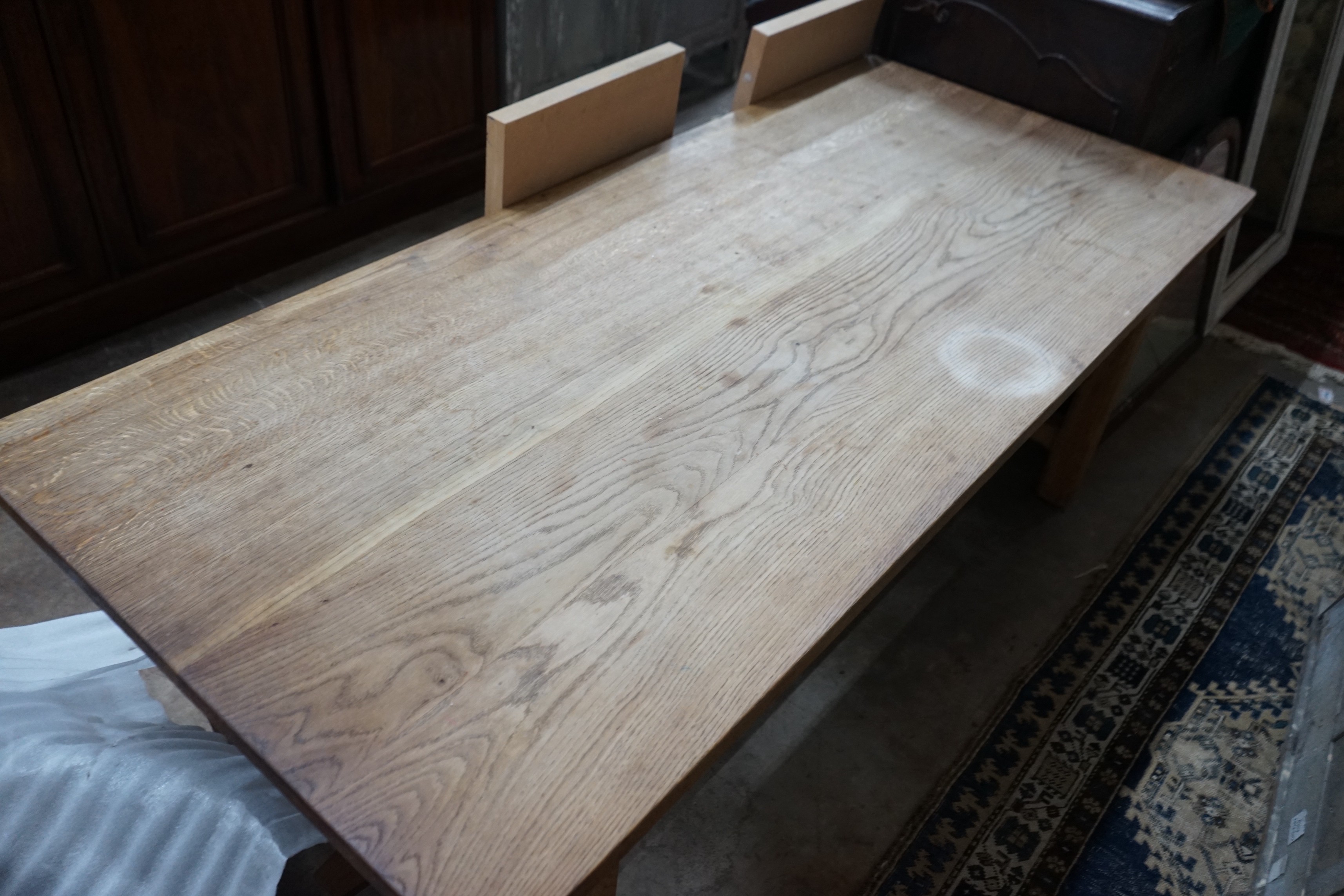 A rectangular oak refectory dining table with later end sections, length 202cm, depth 89cm, height 74cm